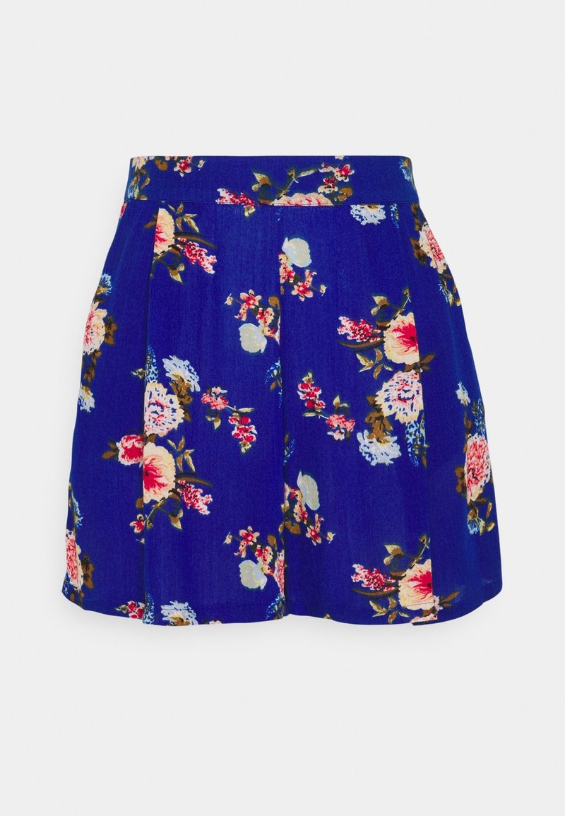 Jupe plissée bleue avec motif floral rose, blanc et rouge et feuilles vertes, présentée à plat sur un fond gris clair.