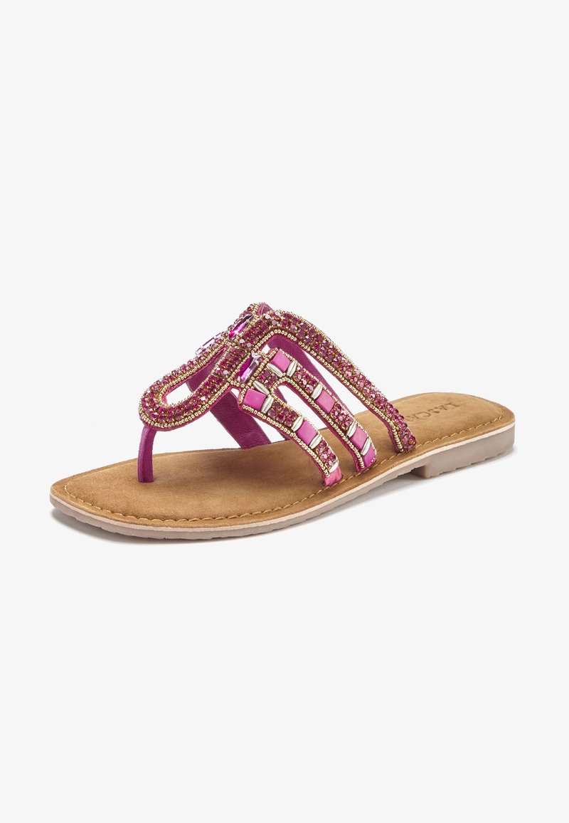 Pink sandal with beaded embellishments, flat sole, T-strap design, suede-like footbed, and decorative hardware accents.