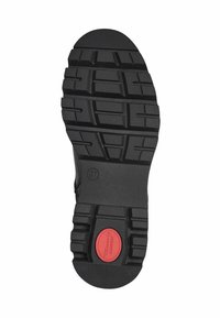 Zwarte schoenzool met een diep profiel, rond rood logo nabij de hak met de tekst "Tarwair's Comfort" en maat gemarkeerd als 37.