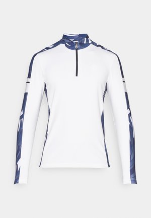 Maglia atletica a maniche lunghe, bianca con maniche a fantasia blu, colletto alto e zip 1/4. Presenta strisce nere a contrasto sulle maniche.