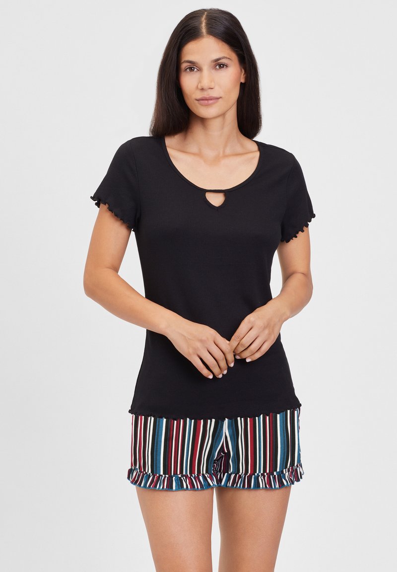 Black, short-sleeve top with a round neckline and a small cutout. Paired with multi-colored striped shorts featuring a ruffled hem.