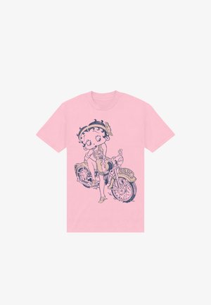 Lyserød bomuldst-shirt med et grafisk motiv af en karakter med store øjne på en motorcykel. Designet inkluderer en sløjfe og teksten "B.M.C." på cyklen.