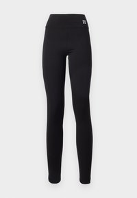 Zwarte leggings met een hoge tailleband, voorzien van het logo "HUGO" in het wit. Gemaakt van soepel, elastisch materiaal, ontworpen voor comfort en een goede pasvorm.