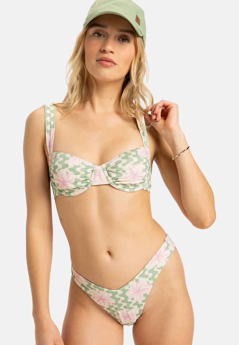Floral patterned bikini in pastel green and pink, made of stretchy fabric. Top features a structured bra style; bottom has a medium-cut design.