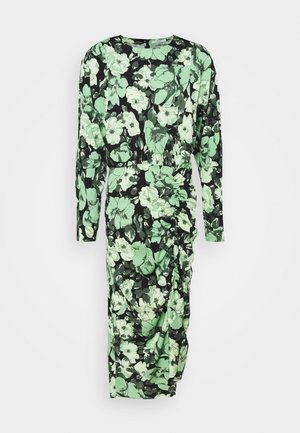 Langærmet kjole med sort baggrund og store grønne blomsterdesigns, draperet sideaccent og rund halsudskæring. Fremstillet af glat stof.