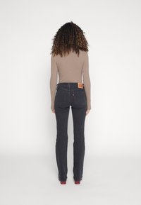 Levi's® Vaqueros bootcut - black denim