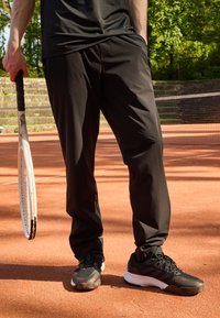 BOSS ACTIVE MOVE - Träningsbyxor - black