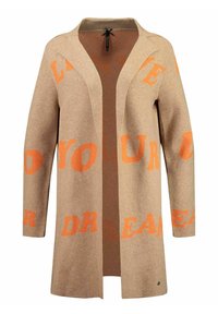 Beige kofta i mjuk stickning med djärva orangea textmönster. Öppen front med långa ärmar, minimal detaljer och en avslappnad siluett.