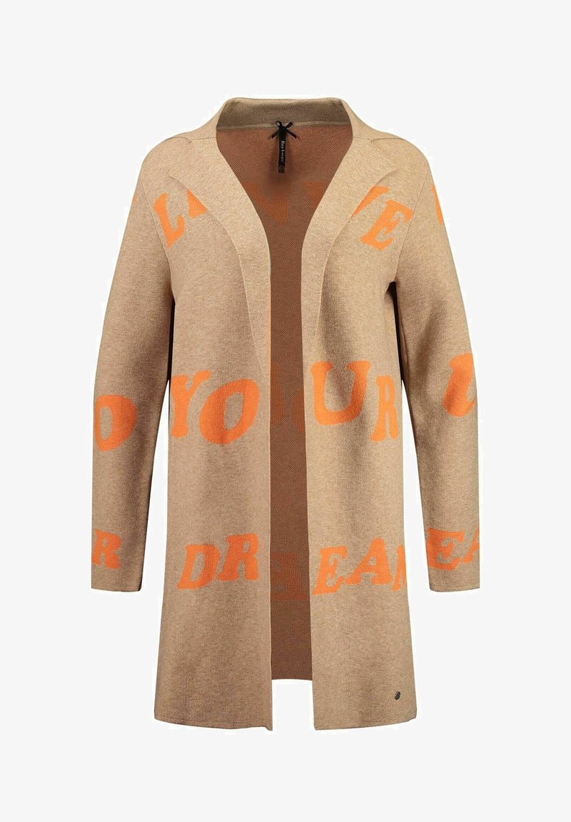 Beige svetr z jemného pletení s výraznými oranžovými vzory. Otevřený přední díl, dlouhé rukávy, minimální detaily a uvolněný silueta.