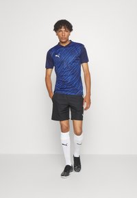 Puma TEAMULTIMATE  - T-shirt print - navy