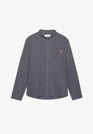 Långärmad grå skjorta med knappar, ficka, krage och subtil textur. Har metallknappar och en liten läderetikett på fickan.