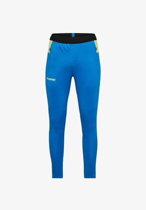 Blauwe sportieve broeken van gladde stof, met een zwarte tailleband, gele accenten en een logo op de onderbeen. Strakke pasvorm.