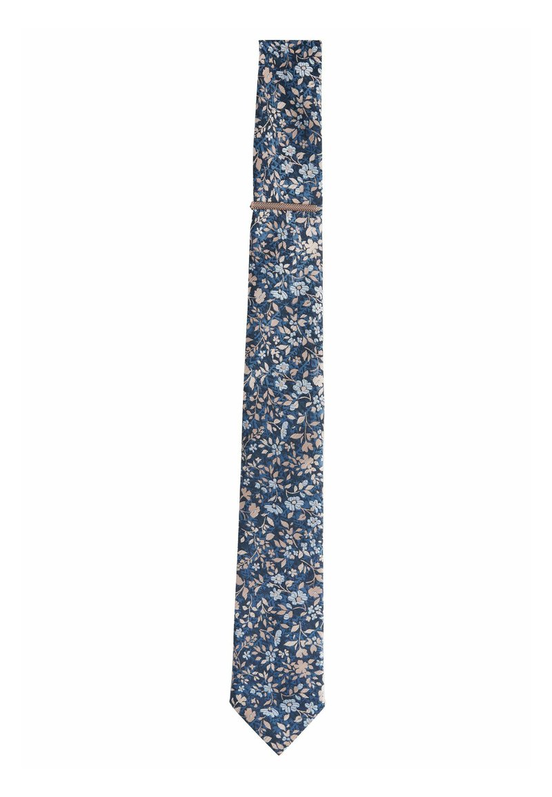 Cravate fleurie sur fond bleu marine, ornée de fleurs bleu pâle et beige. Fabriquée en tissu, avec un design élégant, étroit et une pointe effilée.