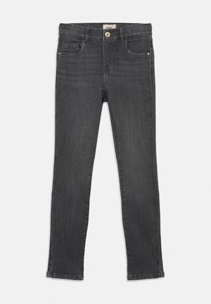 Tamsiai pilkos siaurėjančios kelnės su saga ir užtrauktuku, priekyje kišenės ir diržo kilpos, išdėstytos ant baltos fono.