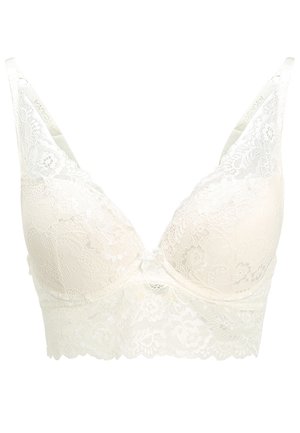 Lace bralette in soft cream with floral patterns, featuring a seamless design, adjustable straps, and scalloped edges for a delicate finish.
