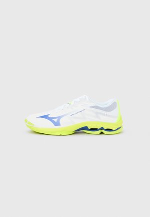 White athletic shoe with blue accents, featuring a mesh upper, prominent cushioning, and a vibrant yellow sole. Lightweight design.