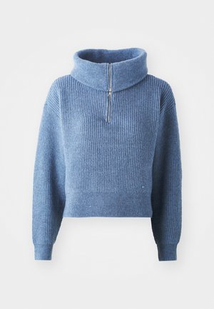 Blue knitted sweater with a high collar and half-zipper. Features ribbed texture, long sleeves, and a cropped design.