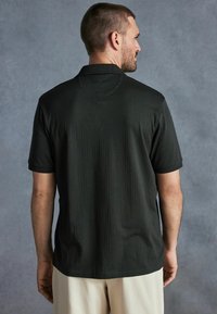 Next Polotričko - olive green