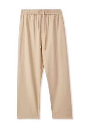 Pantaloni a gamba larga beige chiaro realizzati in tessuto morbido. Presentano una vita elasticizzata con cordino e tasche laterali. Texture liscia.
