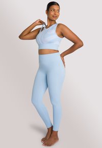OCEANSAPART TARA - Leggings - glacialblue