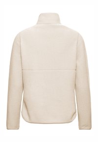 Beige fleece pulloverjack met een hoge kraag, een gestructureerd oppervlak en een rechte zoomlijn. Heeft ingezette mouwen en geen zichtbare hardware.