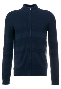 Marinblå zip-up tröja med ett strukturerat stickmönster. Har en högkrage, ribbade ärmslut och midja. Slät inredningsfoder.