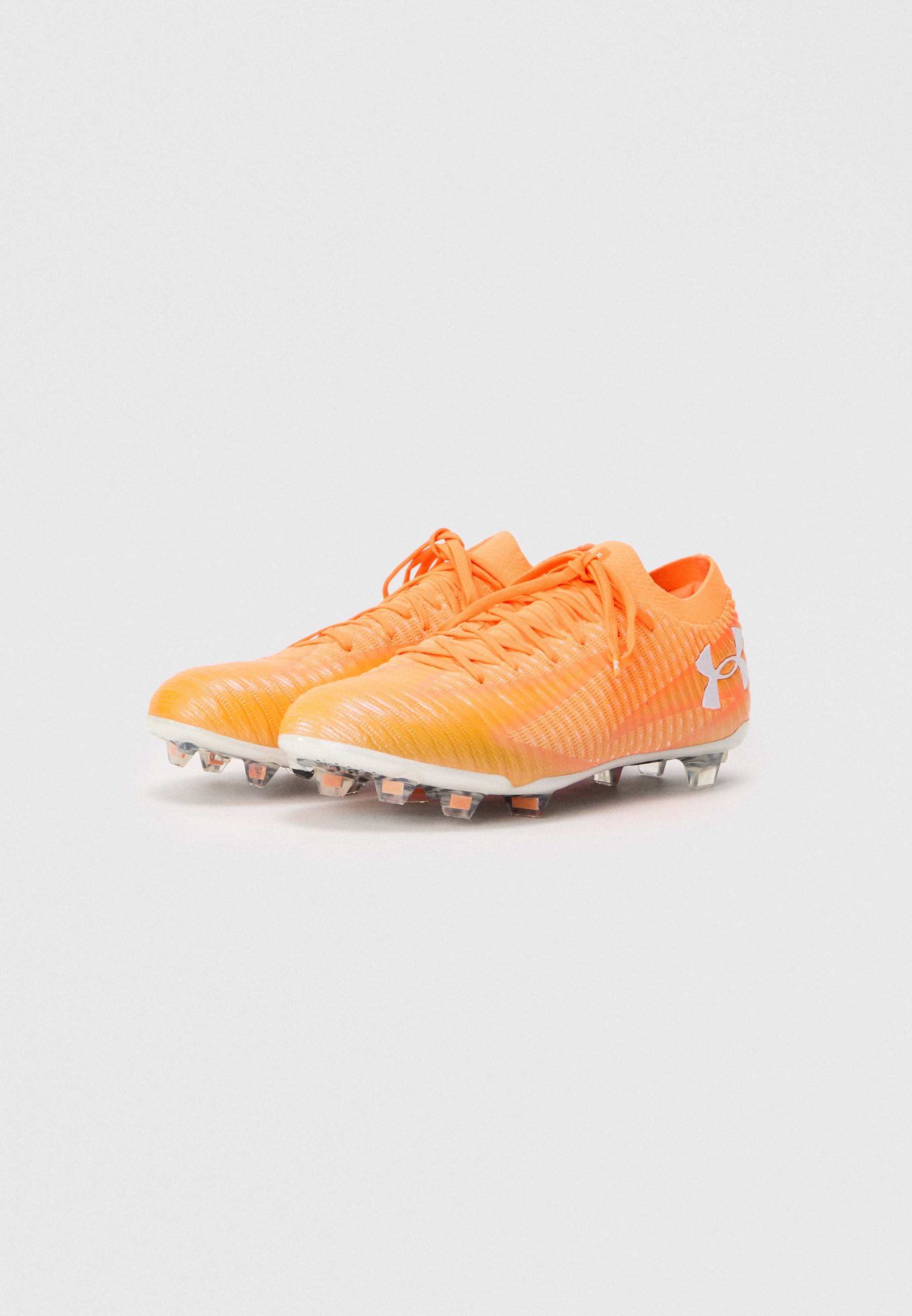 orange and black under armour football cleats