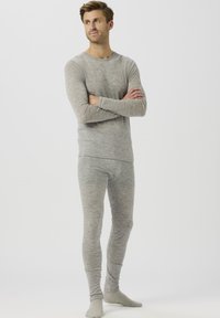 Gray long-sleeve top and matching long underwear set made of soft, textured fabric. The design features a crew neck and tapered fit.