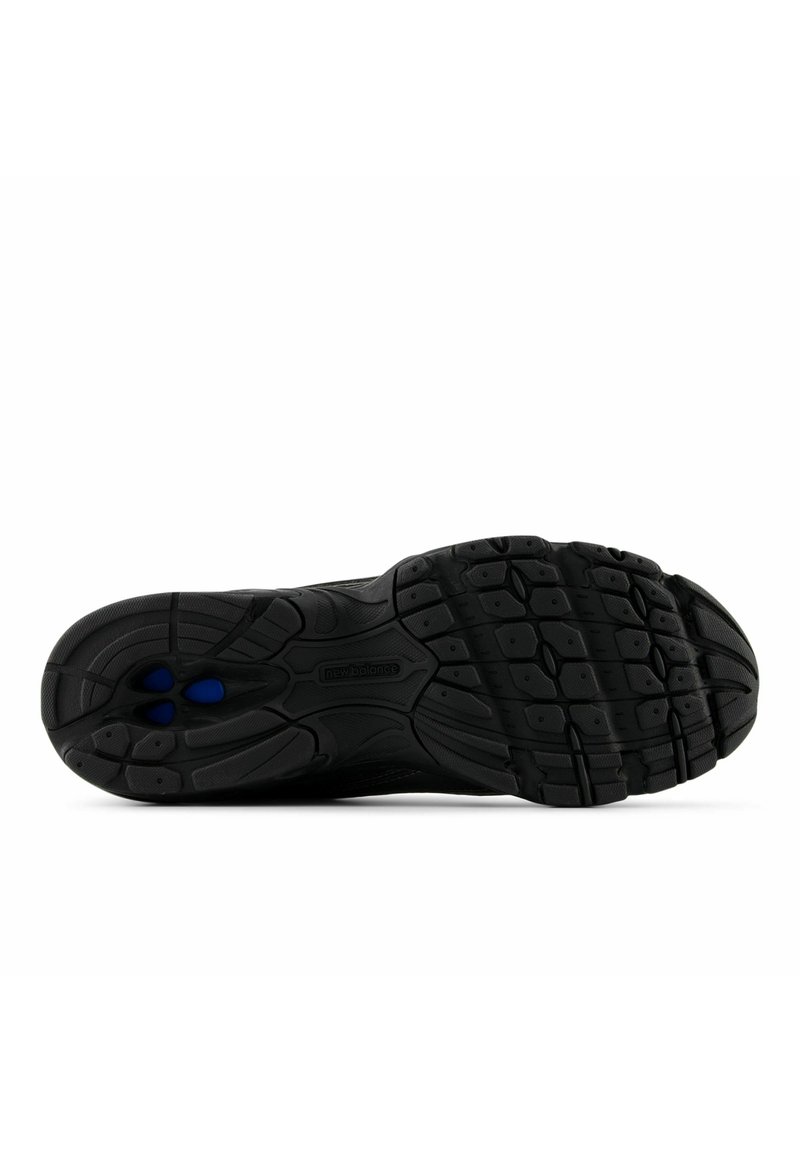 Suola di scarpa sportiva nera con gomma strutturata per maggiore aderenza, con motivi circolari e accenti blu nell'area del tallone per l'ammortizzazione.