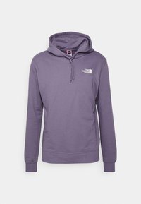 Lila hoodie med snörning i huvan och vit logotyp på bröstet. Långa ärmar med ribbade manschetter och en avslappnad passform. Mjuk textur.