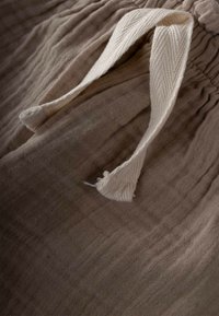 Cigit MUSLIN - Tracksuit bottoms - taupe