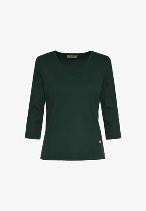 Ciemnozielona bluzka z długim rękawem, z dekoltem w serek i ryżowym wytłoczeniem. Posiada małą metkę z logo w dolnym lewym rogu.