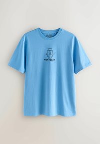 Ljusblå t-shirt med kort ärm som har en liten svart tecknad figur med högtidsmössa och texten "IKVÄLL INTE" centrerad på bröstet.