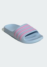 Blue slide sandal with a textured sole and three pink horizontal stripes across the upper. Made from synthetic material.
