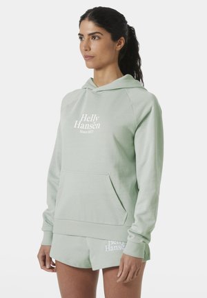 Lichtgroene hoodie met een kangoeroezak, voorzien van witte tekst "Helly Hansen" en "Sinds 1877." Zacht materiaal met een relaxte pasvorm.