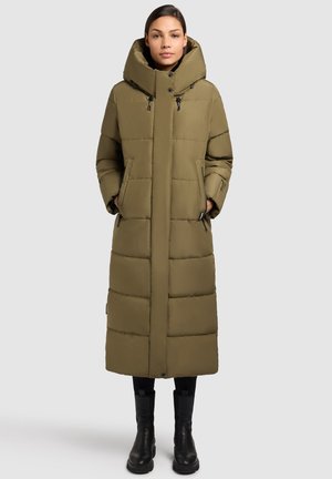 Olive green long puffer coat with a large hood, zippered pockets, and a quilted design. Features buttons at the front and smooth texture.