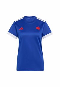 Blå kortärmad tröja i slät tyg med vita muddar och röda detaljer, inklusive en tupp-logotyp och Adidas-ränder.