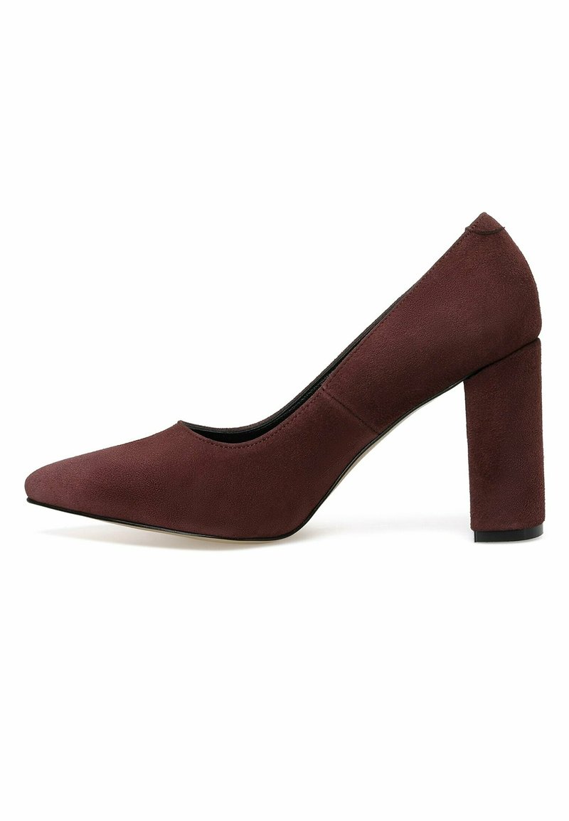 Burgundy suede pump with a pointed toe, a chunky heel, and smooth texture. Features a low-cut front and no visible hardware.