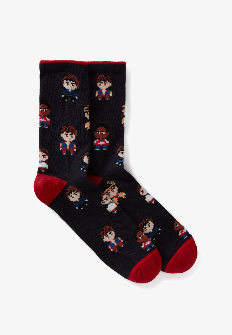 Calcetines hasta la rodilla en color azul marino, con diseños de personajes pixelados en varios colores. Detalles en rojo en el puño y la punta. Tejido suave y texturizado.