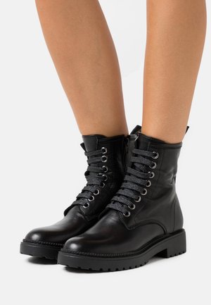 Platform ankle boots - black