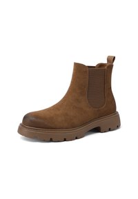 Stivaletto in suede marrone con pannelli laterali elasticizzati, punta arrotondata e suola in gomma spessa con un motivo a scanalature profonde per una migliore aderenza.