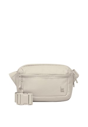 Marsupio beige con tasca frontale con zip e tracolla regolabile con fibbia, marchiato con il logo "GOT BAG" nell'angolo in basso a destra.