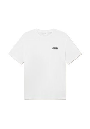 White cotton t-shirt with a crew neckline, short sleeves, and a small black logo patch on the left chest area. Smooth texture, standard fit.