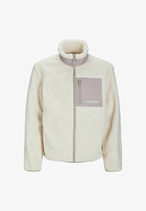 Kremkrāsas flīsa jaka ar augstu apkakli, priekšējo rāvējslēdzēju un pelēko krūšu kabatu ar rāvējslēdzēju un zīmolu. Iekļautas divas sānu kabatas.