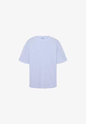 T-shirt oversize azzurro chiaro con collo rotondo, maniche corte e una texture liscia. Design minimale, senza motivi o accenti visibili.