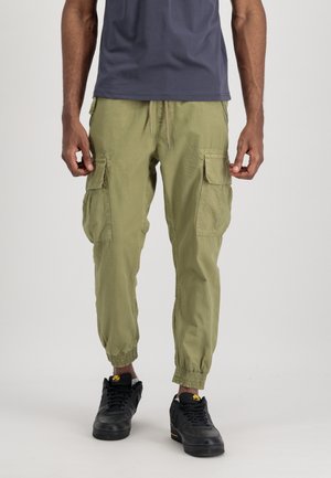 Cargo pants in olive green, featuring elastic cuffs, multiple side pockets, and a drawstring waist, made from lightweight fabric.