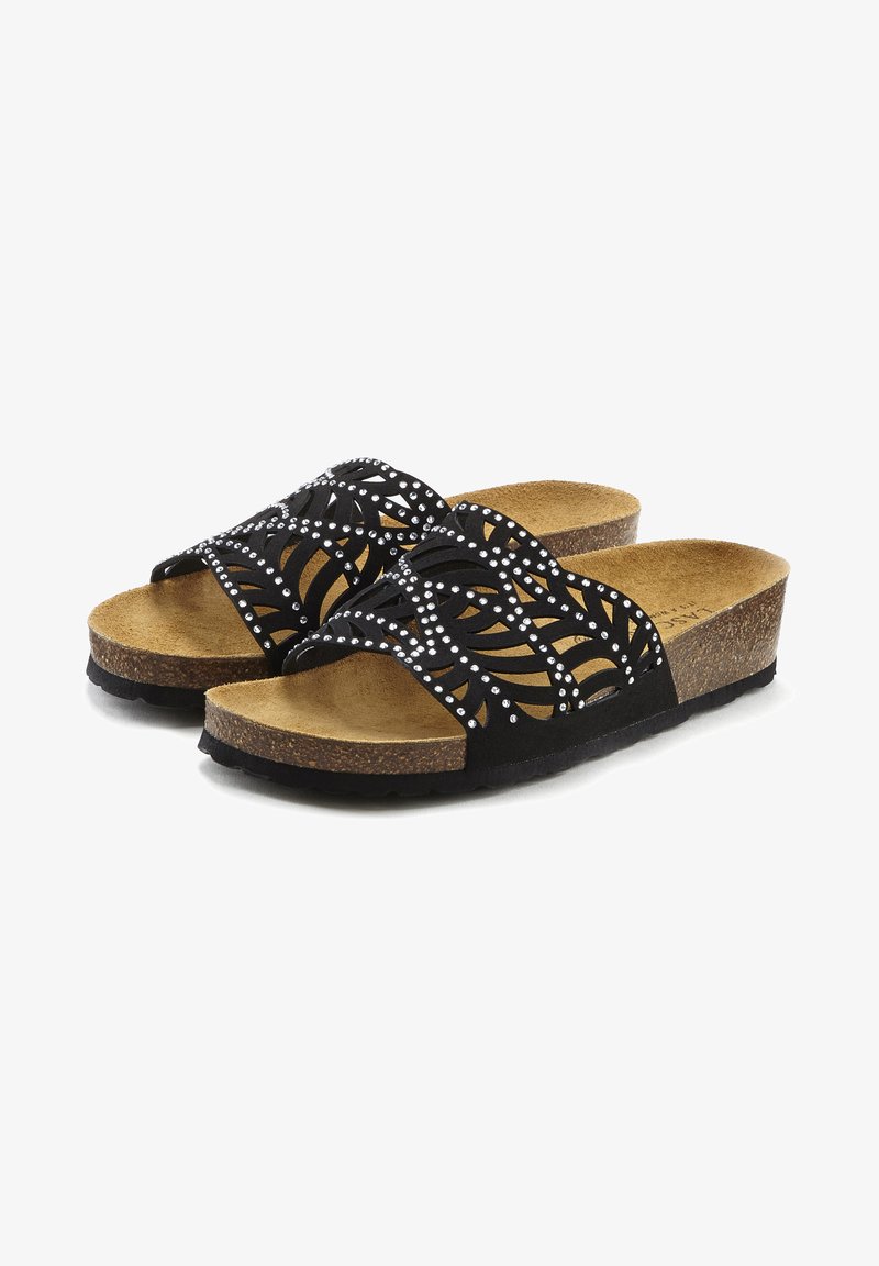 Black sandals with perforated design and rhinestone accents. Cork footbed and textured rubber sole for support and grip.
