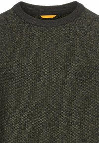Knit sweater featuring a textured dark green pattern, crew neckline, and ribbed cuffs. Accented with a contrasting orange label inside.