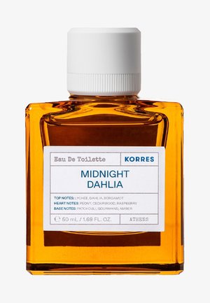 Amberfarvet glasflaske med Korres Midnight Dahlia eau de toilette, 50 ml, med hvid hætte og etikette, der angiver duftnoter.