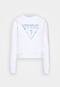 Sweatshirt court blanc à manches longues. Présente un logo triangle holographique multicolore sur le devant avec le texte « GUESS U.S.A. ».